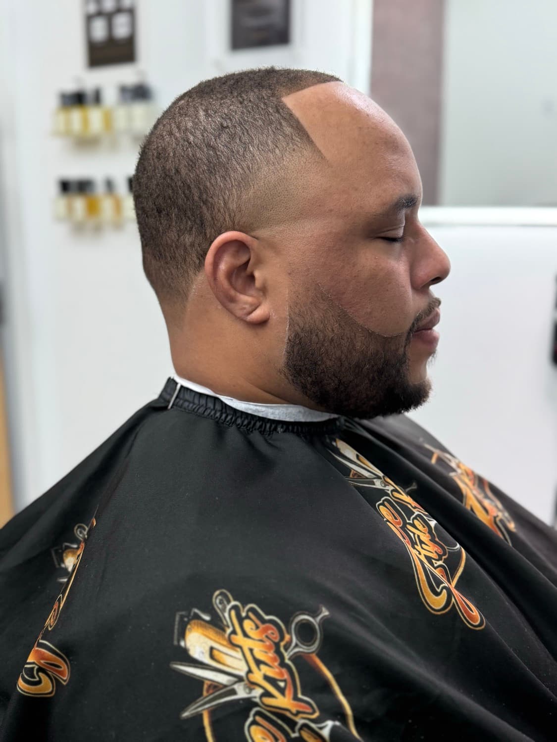 A fresh bald fade and beard at Free Style Kuts